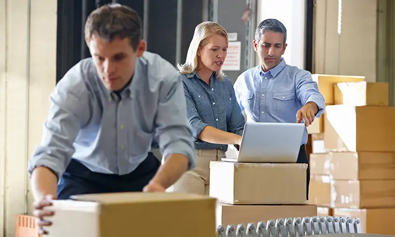 warehouse employees sending out deliveries