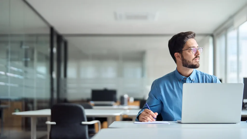employee working on their laptop with digital workspace enhancements