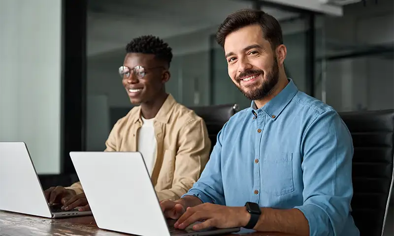Office workers collaborating over the network