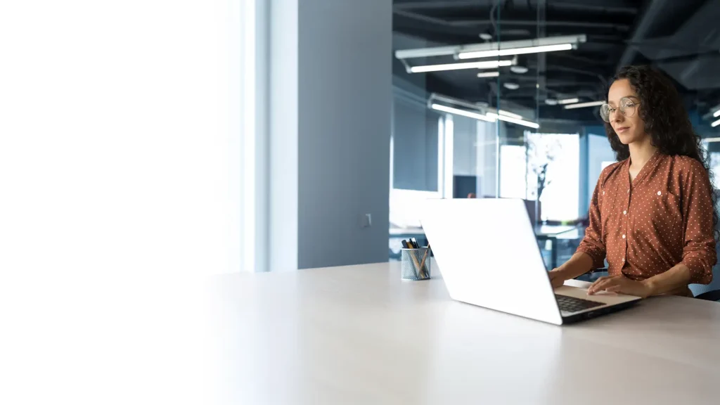 Woman utilizing VMware products in an office space