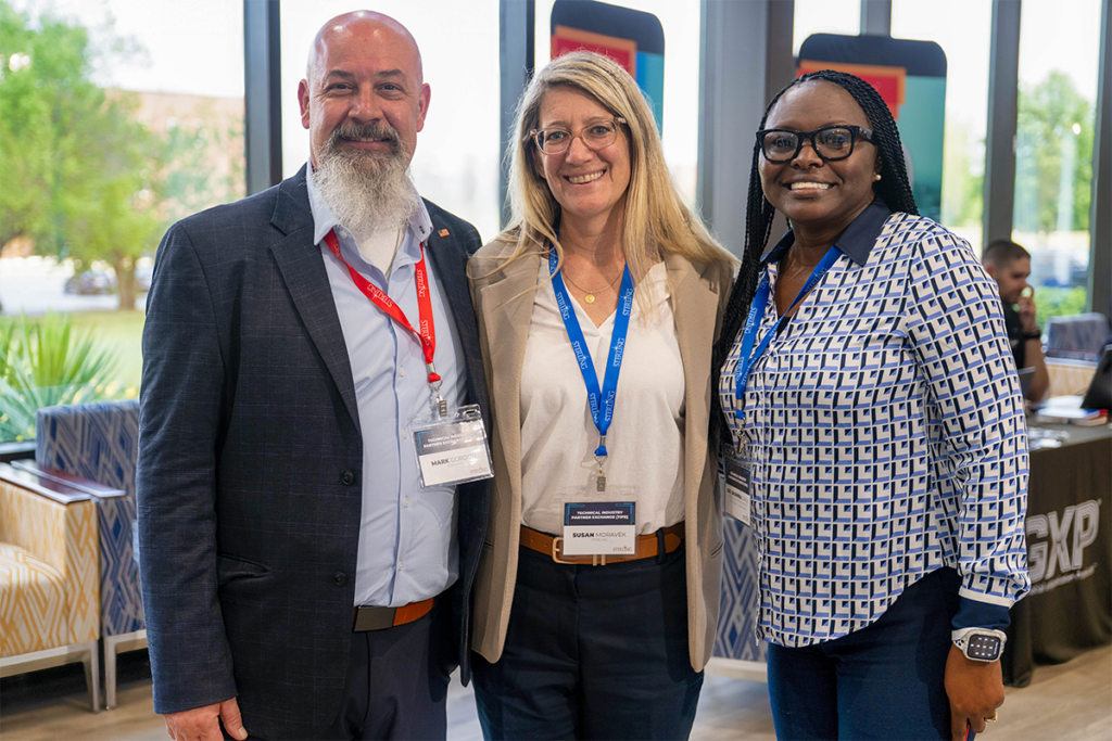 Sterling's Mark Gordon and Susan Moravek with a Fort Valley State University team member.
